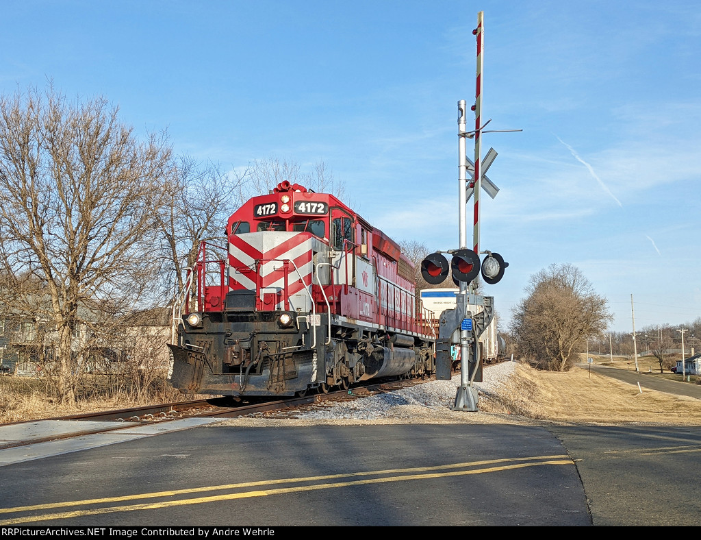 WAMX 4172 stands ready to take the five-car local back to Madison after switching the industries